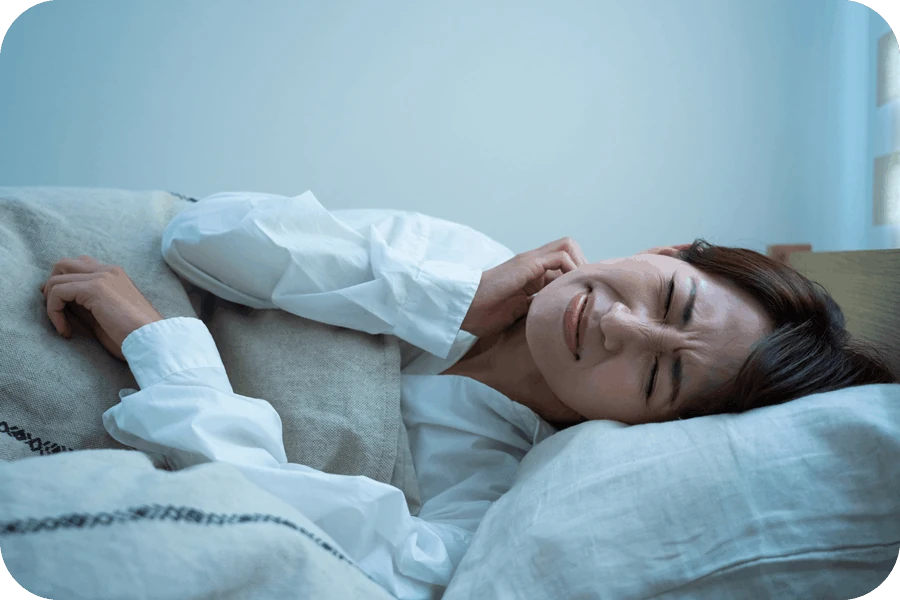 寝つきが悪く眠れない女性